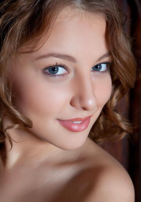 Rangy teen Nikia A revealing small tits and spreading her legs 